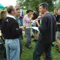 John chats to someone, Qualcomm goes Punting on the Cam, Grantchester Meadows, Cambridge - 18th August 2005