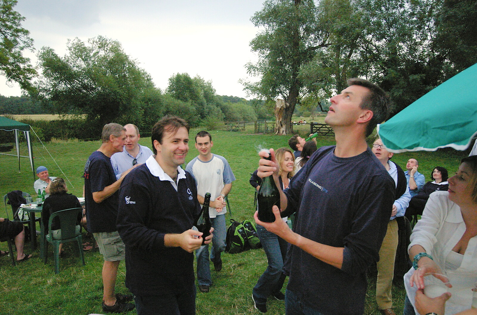 A champagne cork is popped from Qualcomm goes Punting on the Cam, Grantchester Meadows, Cambridge - 18th August 2005