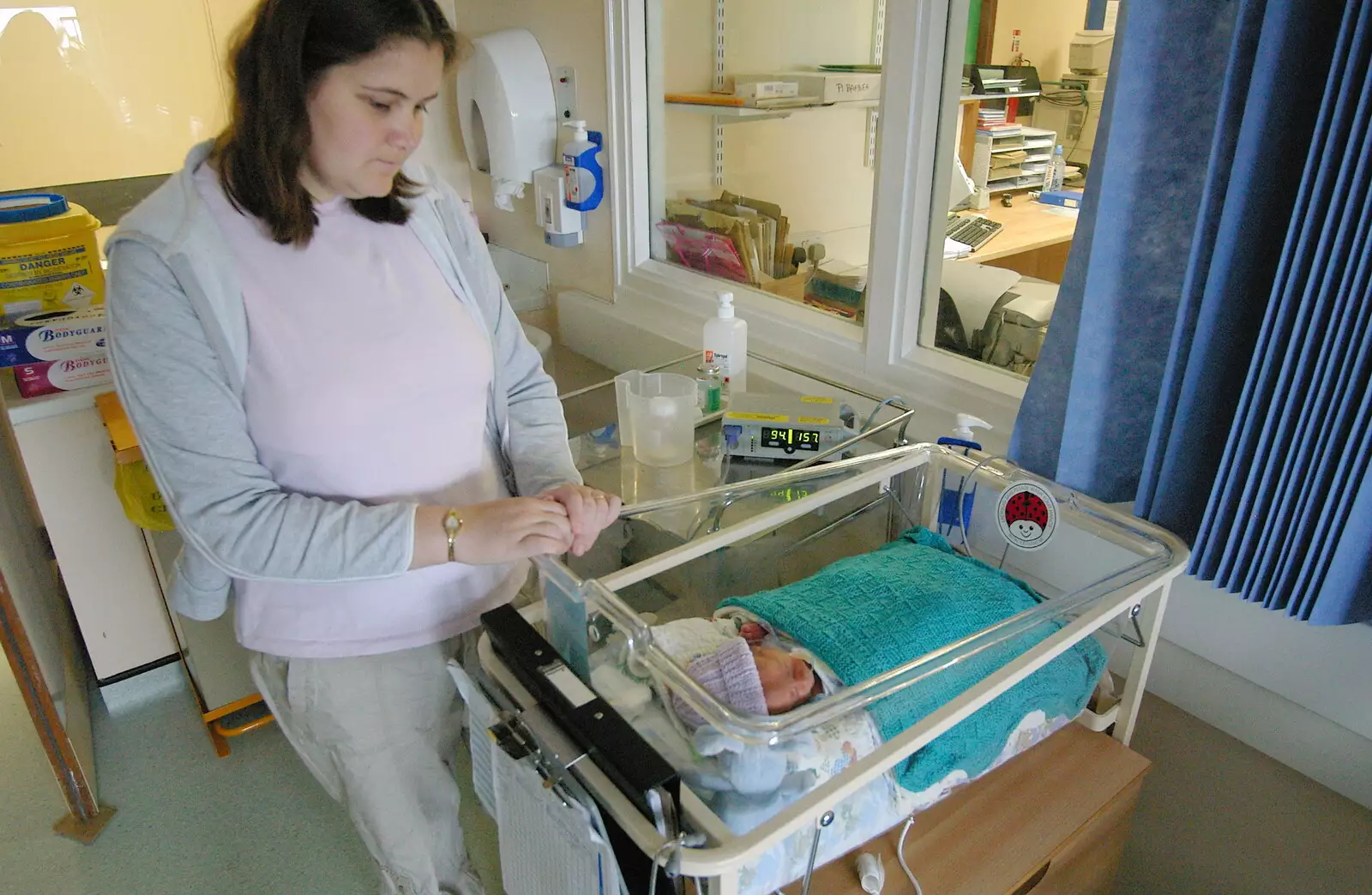 Claire has another look, from Life on the Neonatal Ward, Dairy Farm and Thrandeston Chapel, Suffolk - 26th August 2005