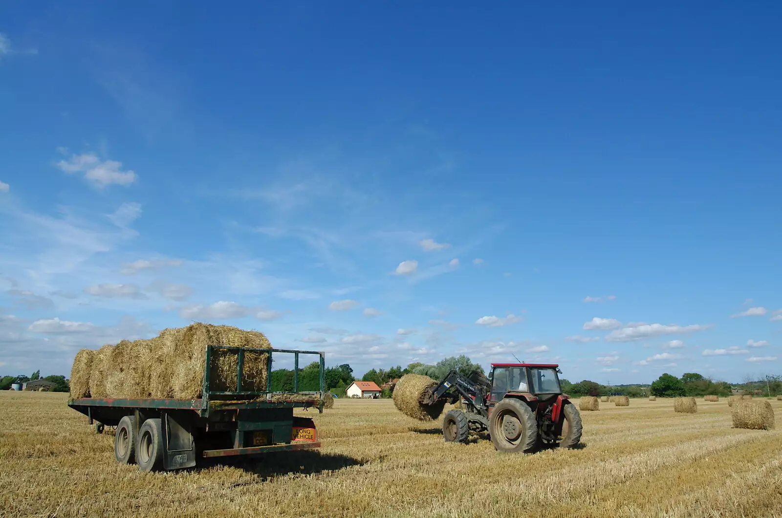 Phil hauls some bales around, from Life on the Neonatal Ward, Dairy Farm and Thrandeston Chapel, Suffolk - 26th August 2005