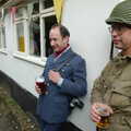 2005 DH and Marc lean nonchalantly against the village hall