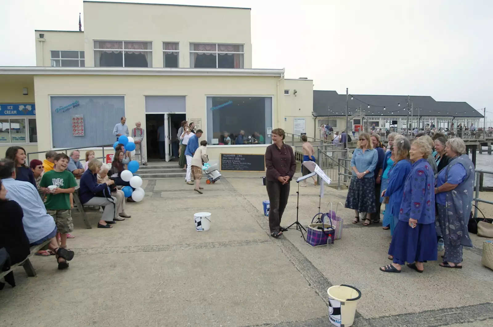 Crowds watch the choir, from Sally and Paul's Wedding on the Pier, Southwold, Suffolk - 3rd September 2005