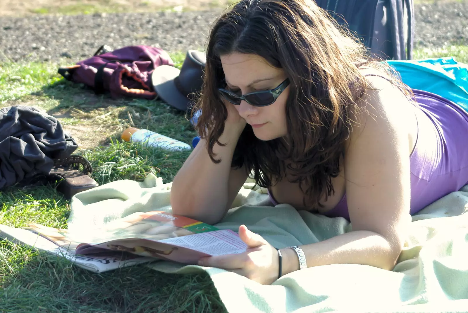 Clare reads a magazine, from Picnic at the Heath, Knettishall, Norfolk - 4th September 2005