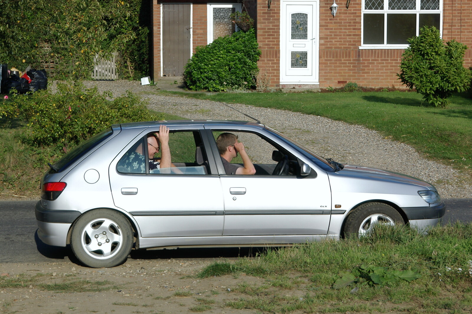 The boys wait in the car at Wortham from Picnic at the Heath, Knettishall, Norfolk - 4th September 2005