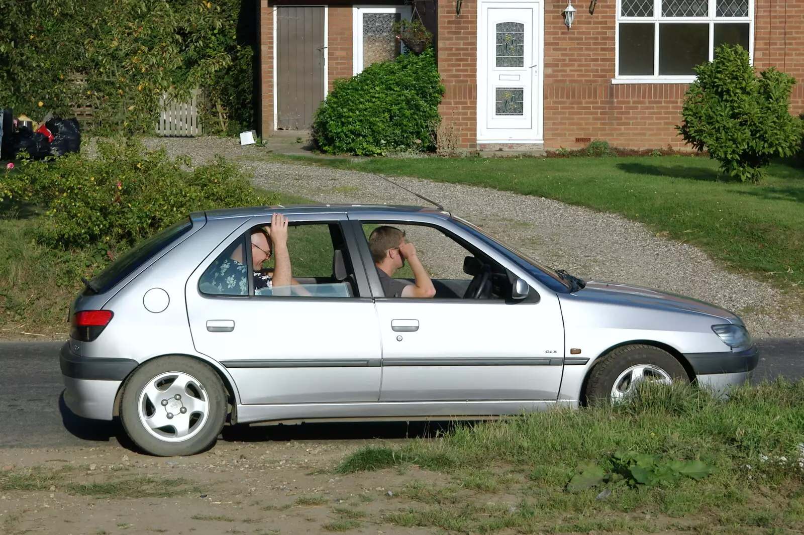 The boys wait in the car at Wortham, from Picnic at the Heath, Knettishall, Norfolk - 4th September 2005