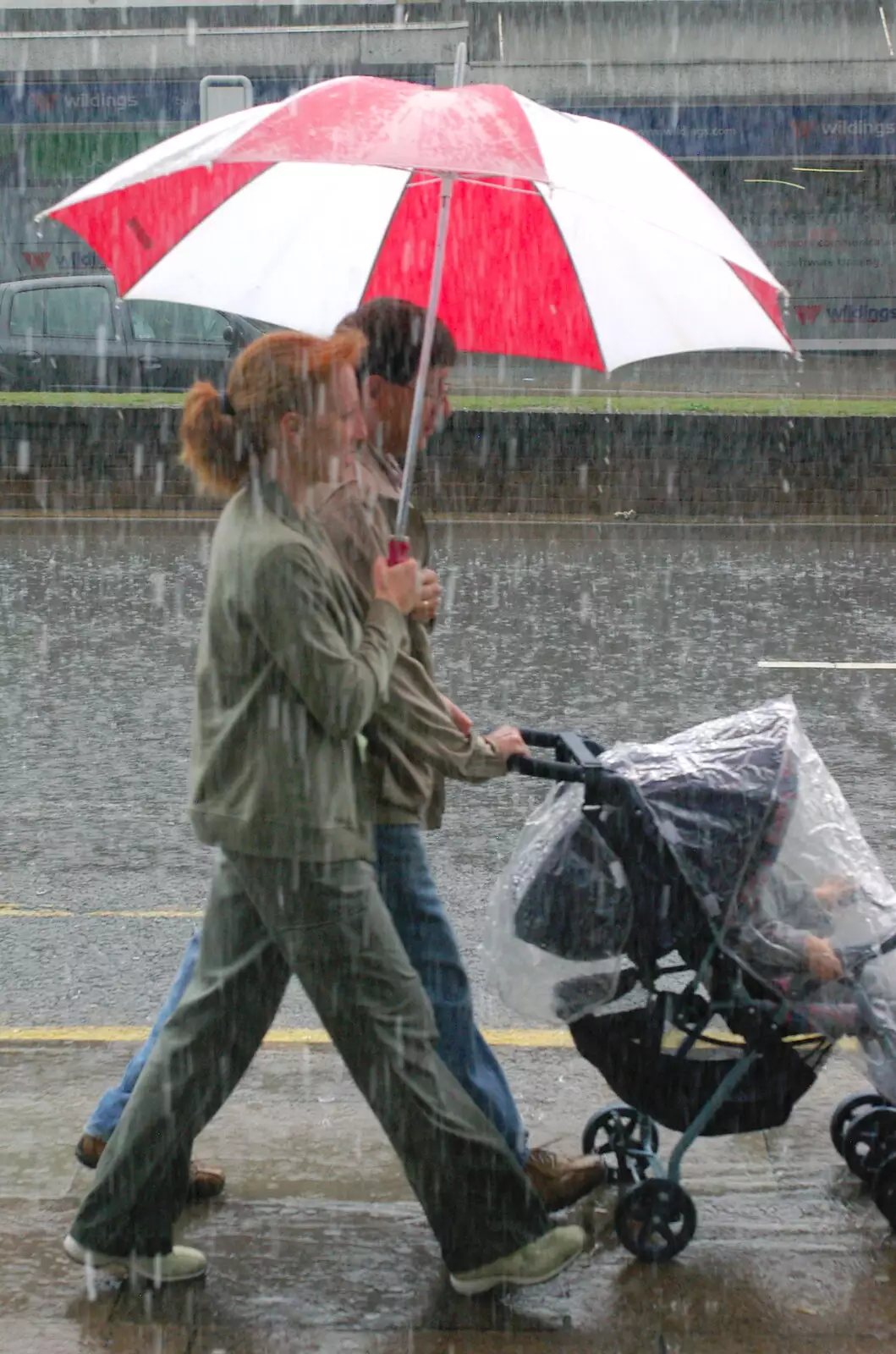 Umbrellas and buggies, from Cambridge Floods, Curry Night and an Ipswich Monsoon - 10th September 2005