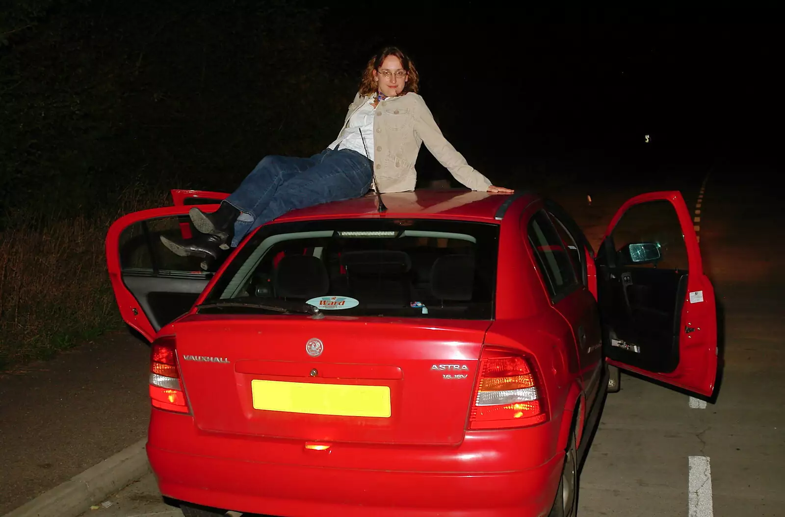 Sue lounges on the roof of Bill's car, from The Banham Barrel Beer Bash, Banham, Norfolk - 17th September 2005