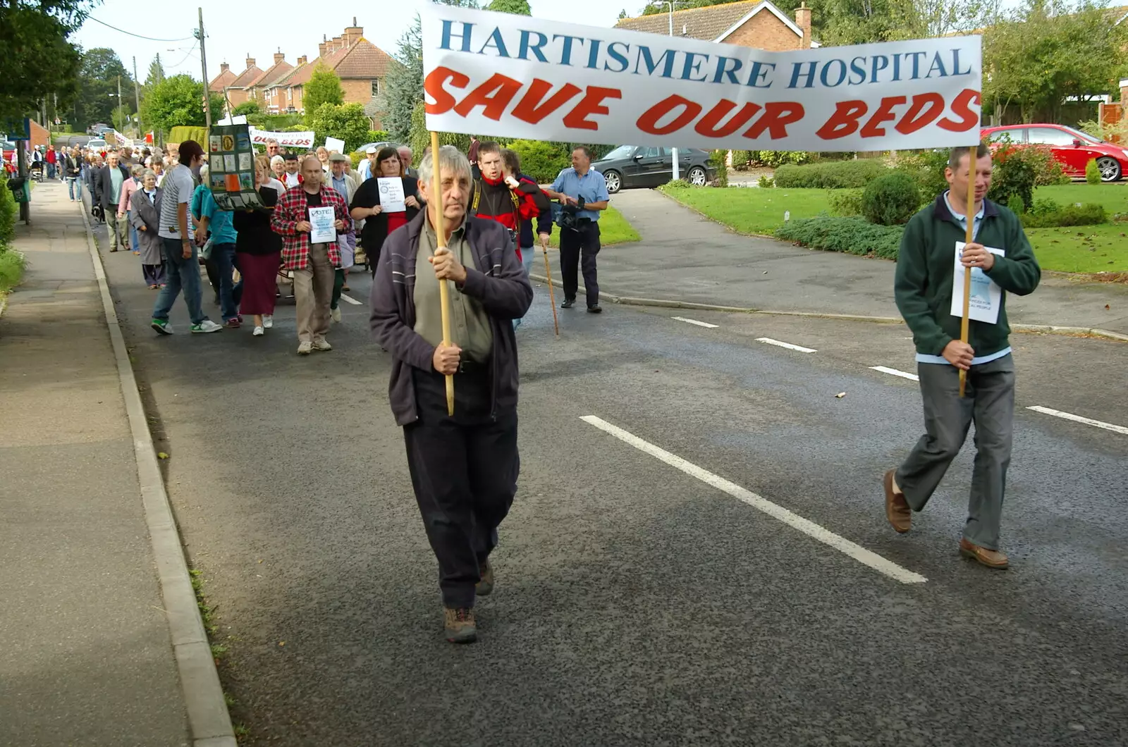 The march makes its way down Castleton Way, from Save Hartismere: a Hospital Closure Protest, Eye, Suffolk - 17th September 2005