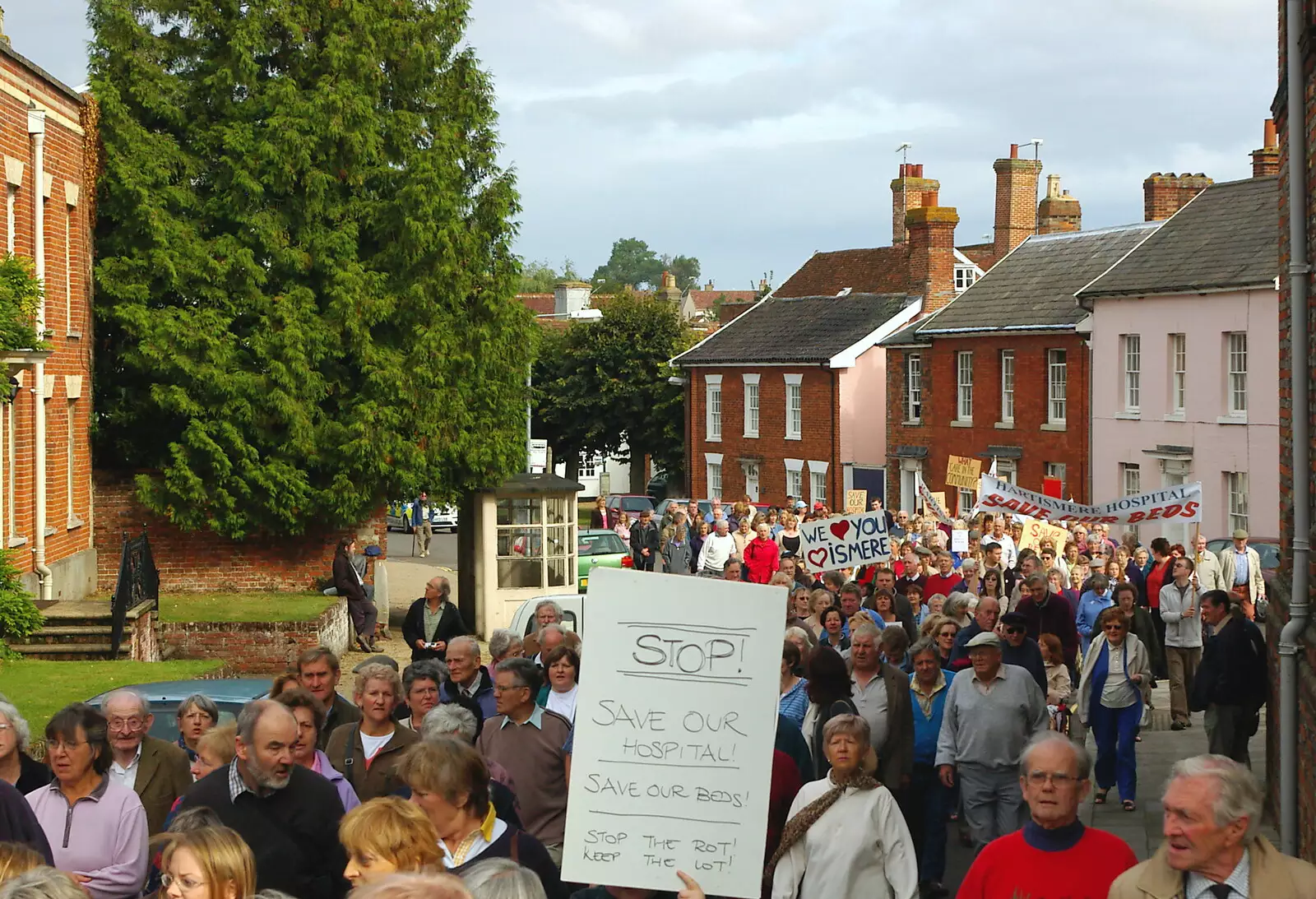 The march heads round the back of the town hall, from Save Hartismere: a Hospital Closure Protest, Eye, Suffolk - 17th September 2005