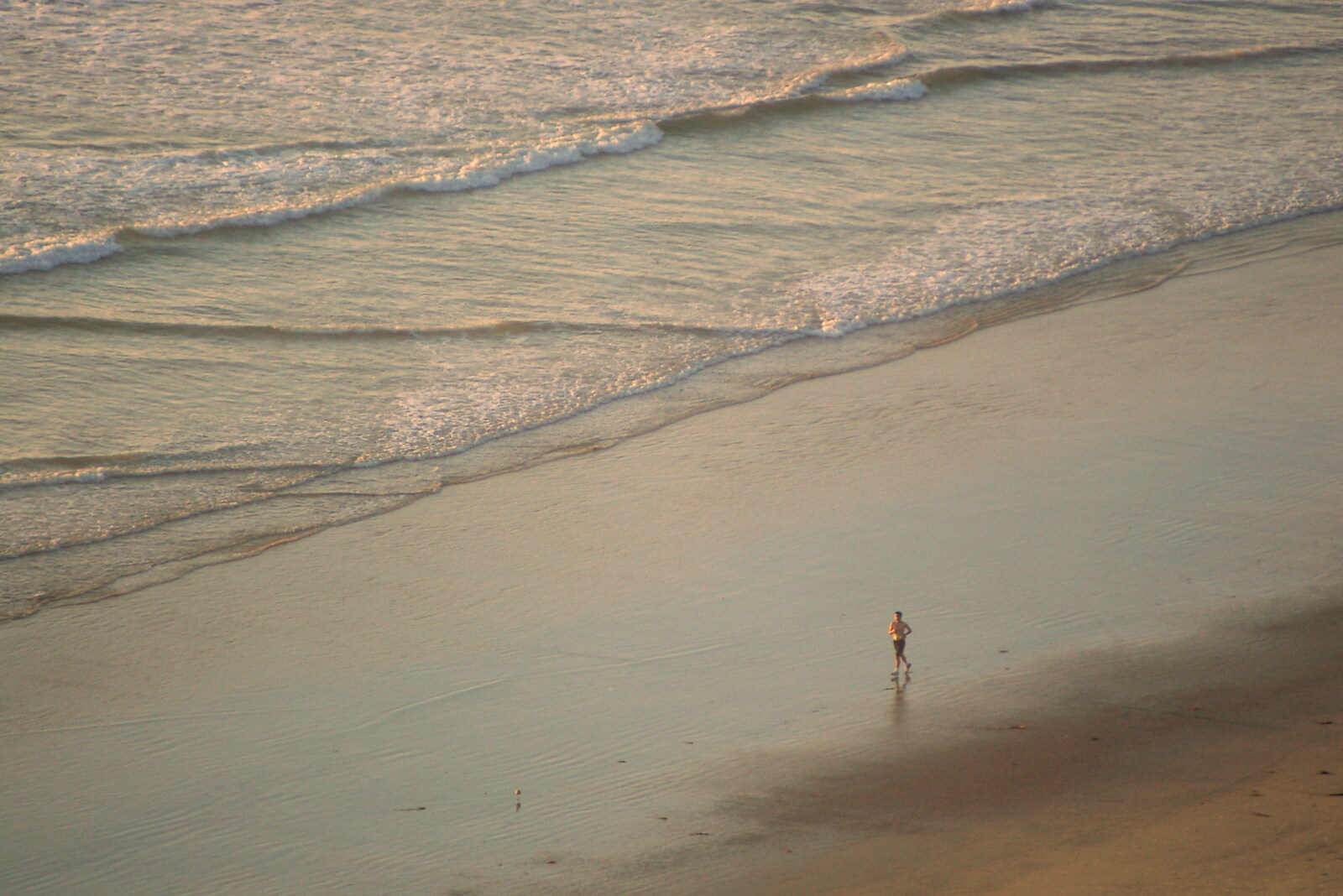 A lone jogger on the beach from San Diego Four, California, US - 22nd September 2005