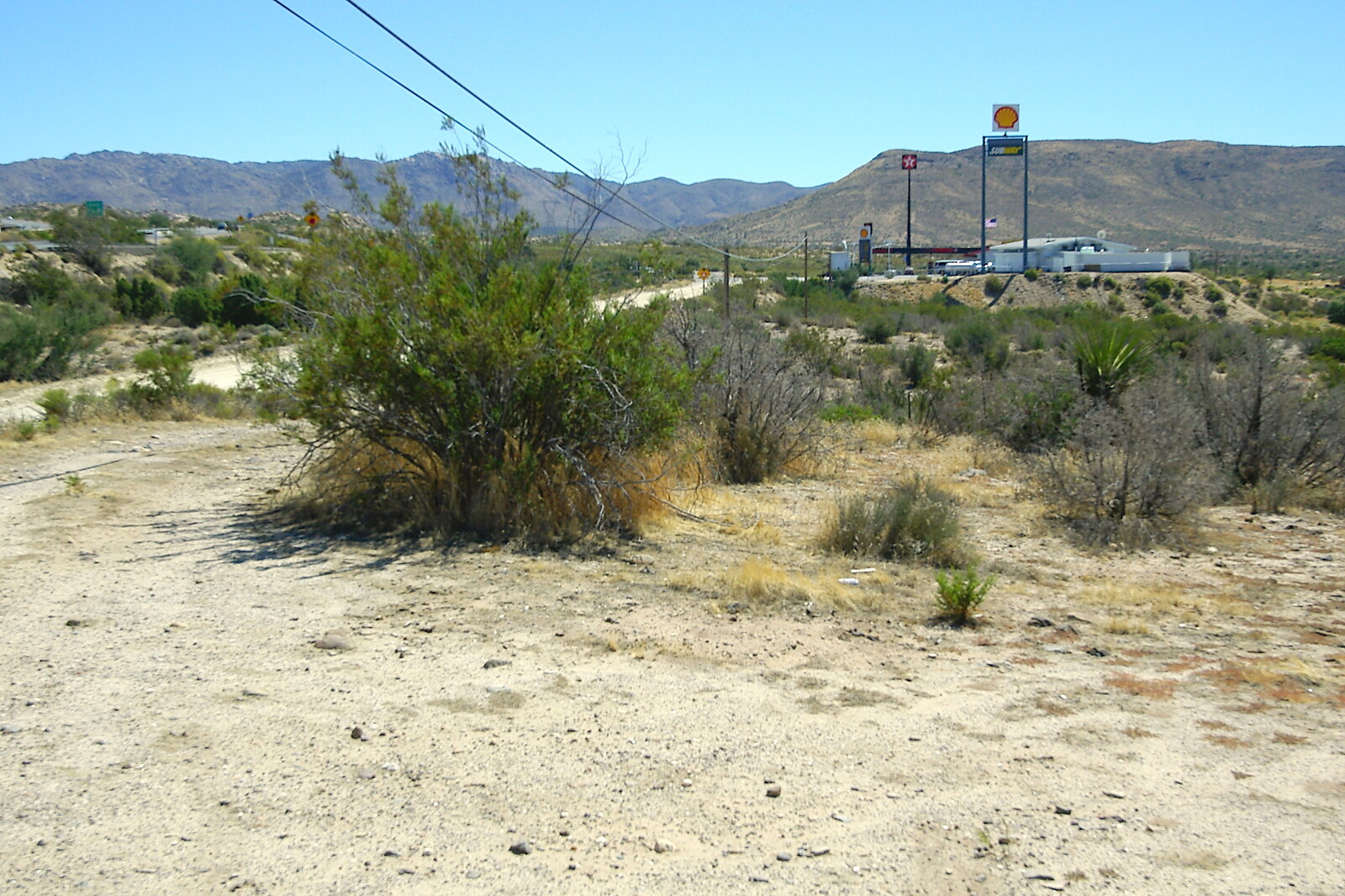 Desert scrub and a petrol station from California Desert: El Centro, Imperial Valley, California, US - 24th September 2005