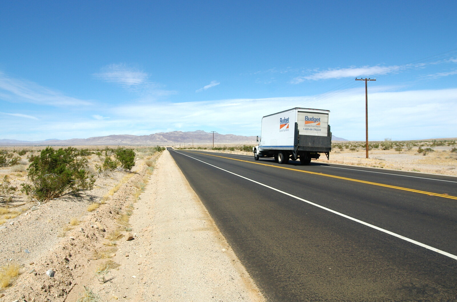 A Budget rent-a-van trundles by from California Desert: El Centro, Imperial Valley, California, US - 24th September 2005