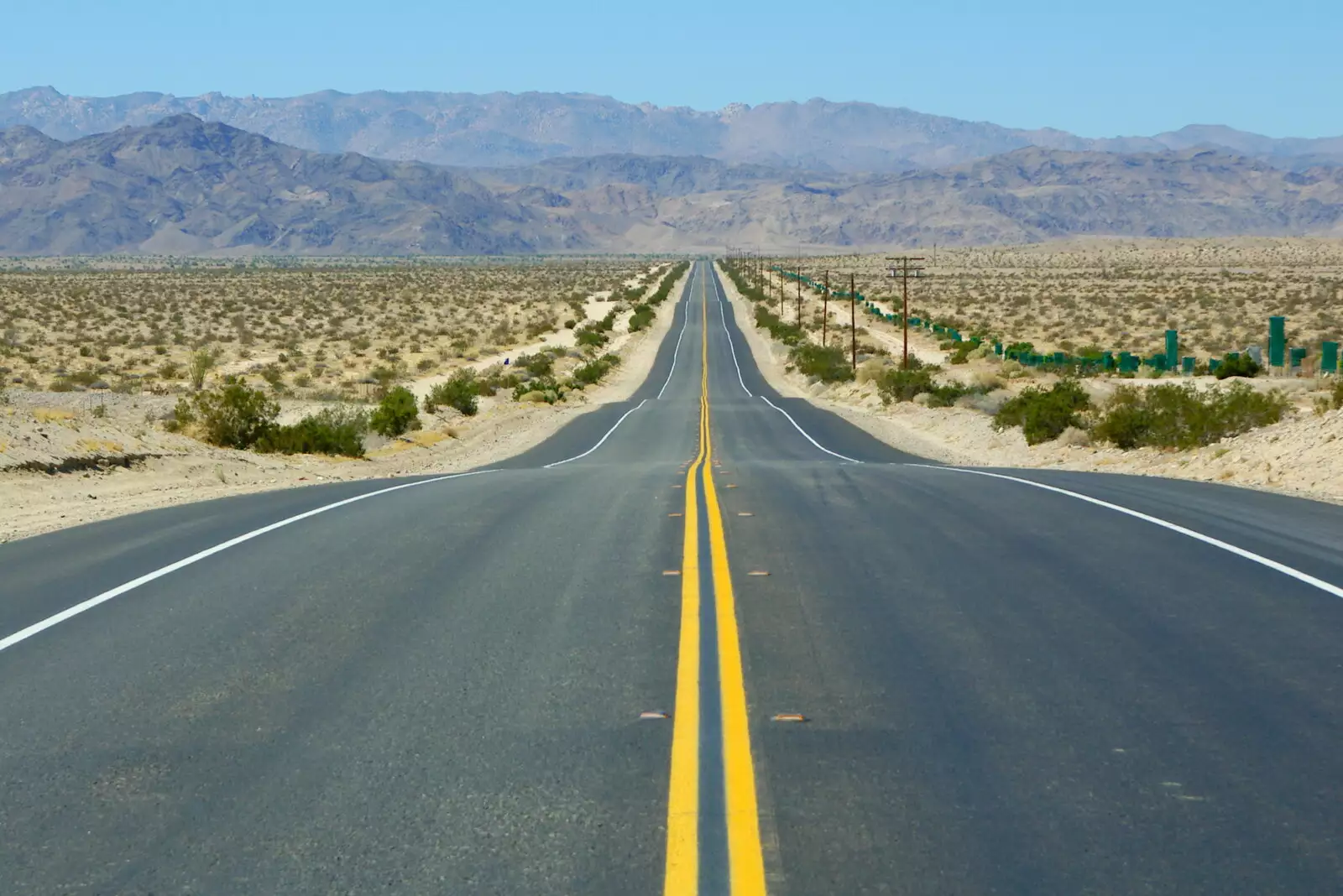 Classic vanishing-point view of Route 98, from California Desert: El Centro, Imperial Valley, California, US - 24th September 2005