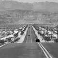 Cars on the ribbon of a highway, California Desert: El Centro, Imperial Valley, California, US - 24th September 2005