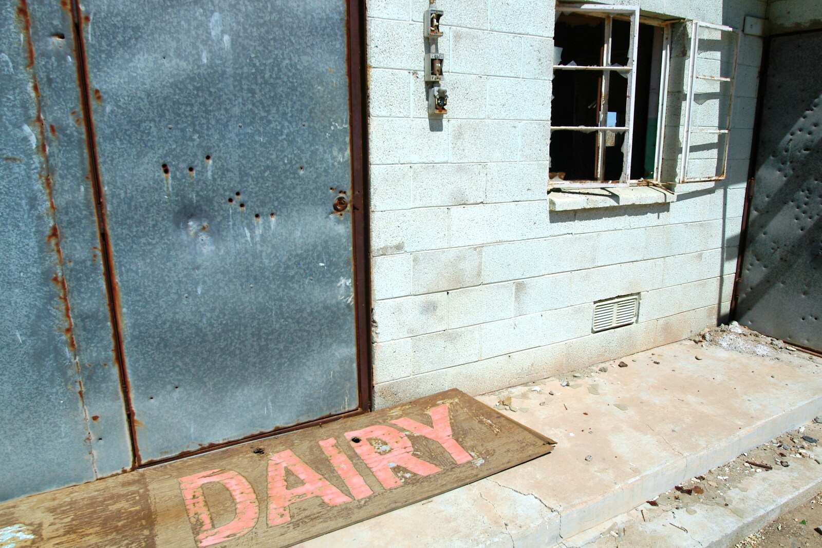 The dairy's front-door, all shot-up from California Desert: El Centro, Imperial Valley, California, US - 24th September 2005