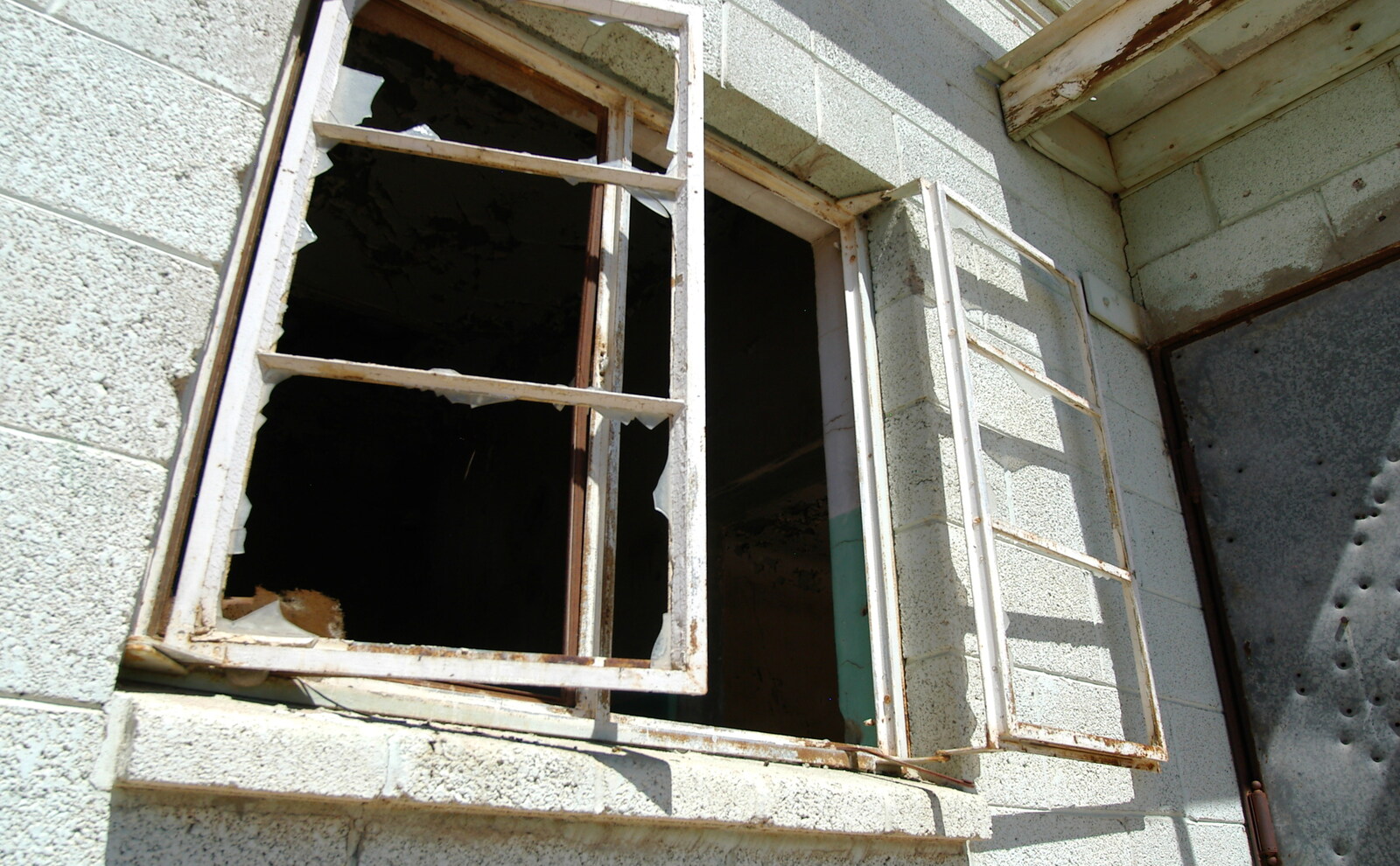 Smashed 1930s-style windows from California Desert: El Centro, Imperial Valley, California, US - 24th September 2005