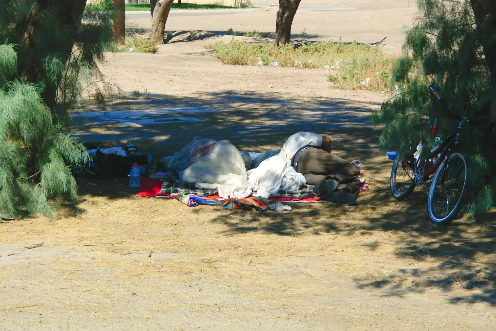 A homeless dude has a sleep, from California Desert: El Centro, Imperial Valley, California, US - 24th September 2005