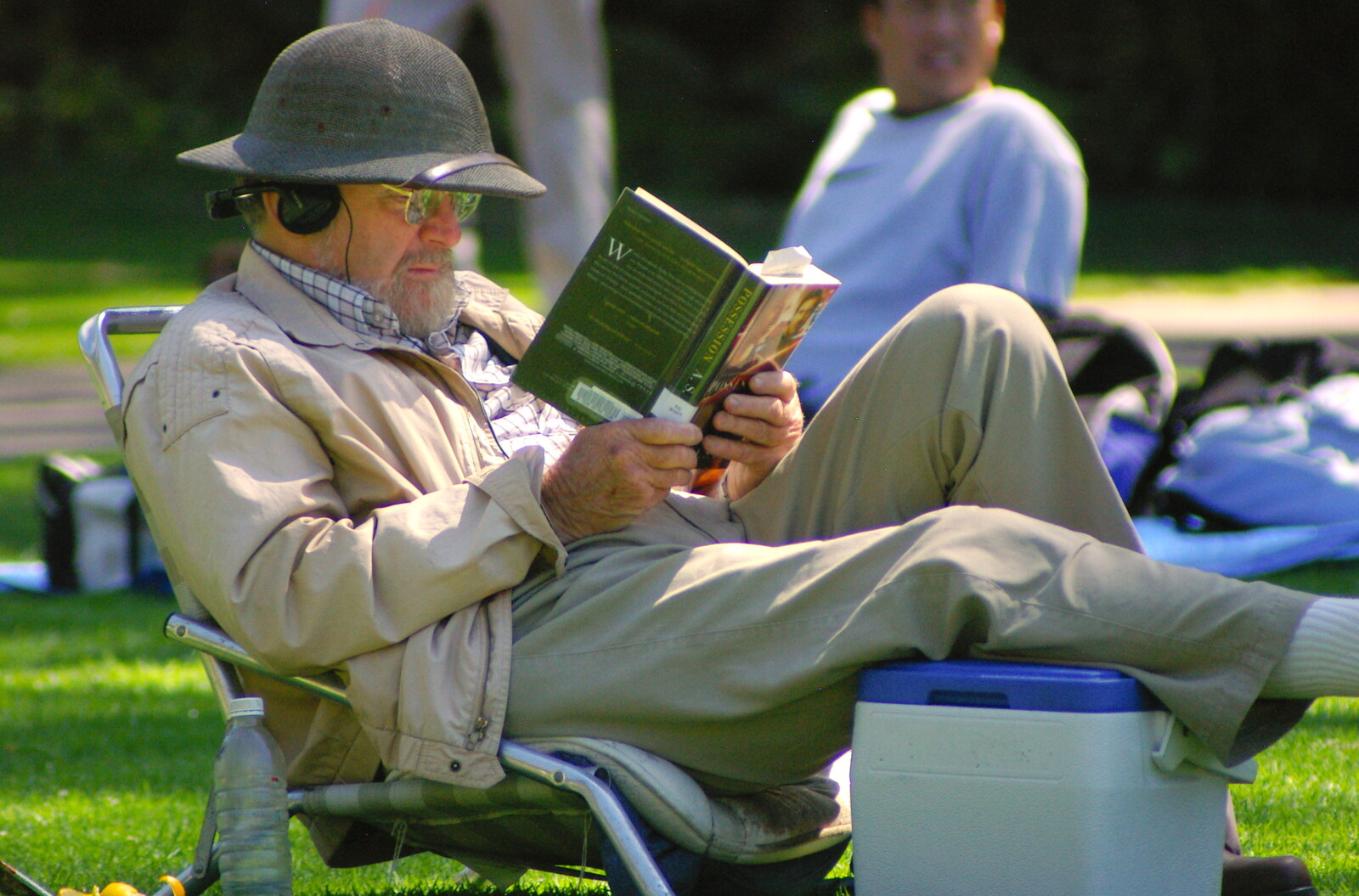 Scenes and People of Balboa Park, San Diego, California - 25th September 2005: Some dude reads a book