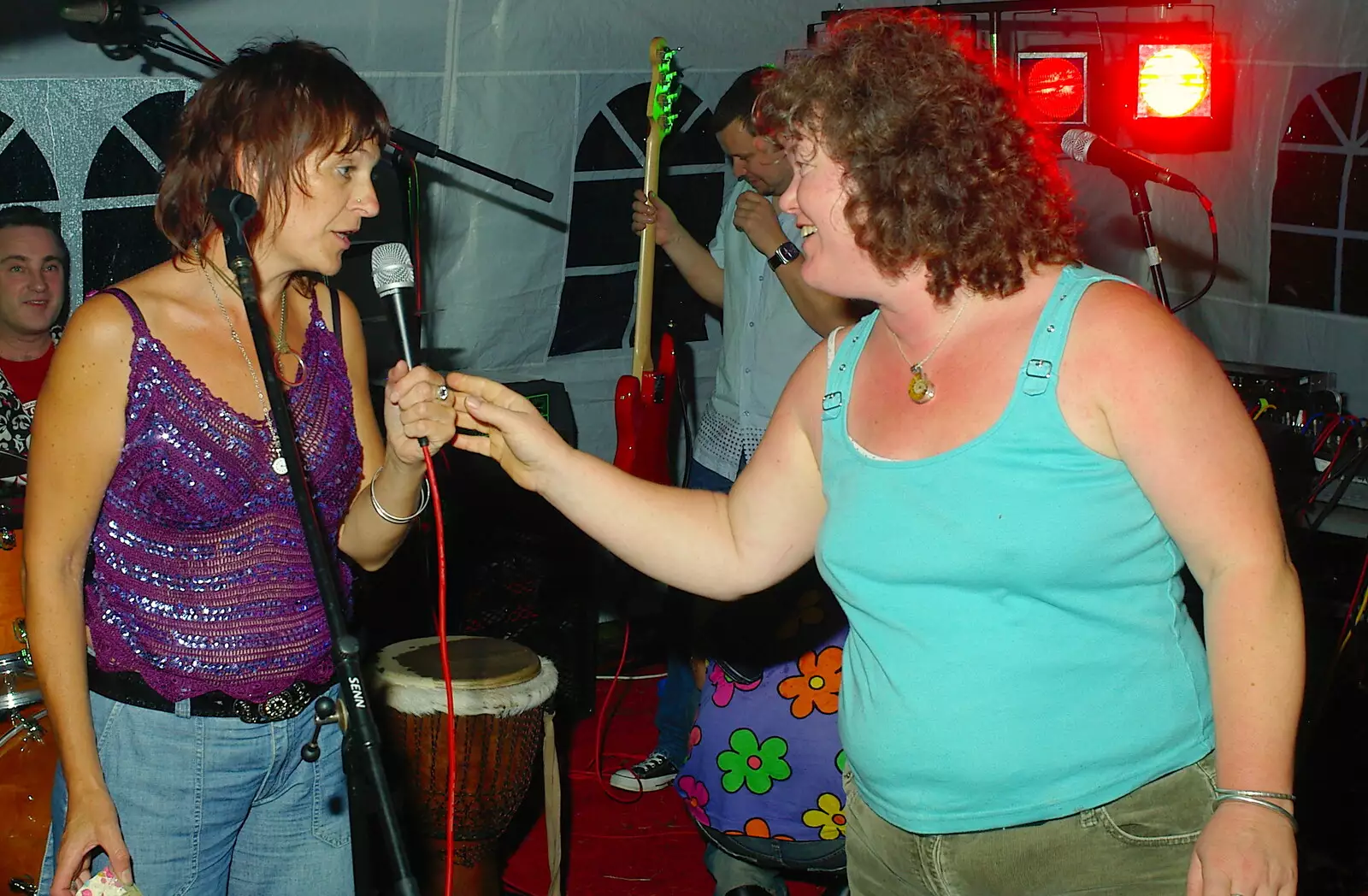 Jo hands back the mic, from Jo and Steph's Party, Burston, Norfolk - 30th September 2005