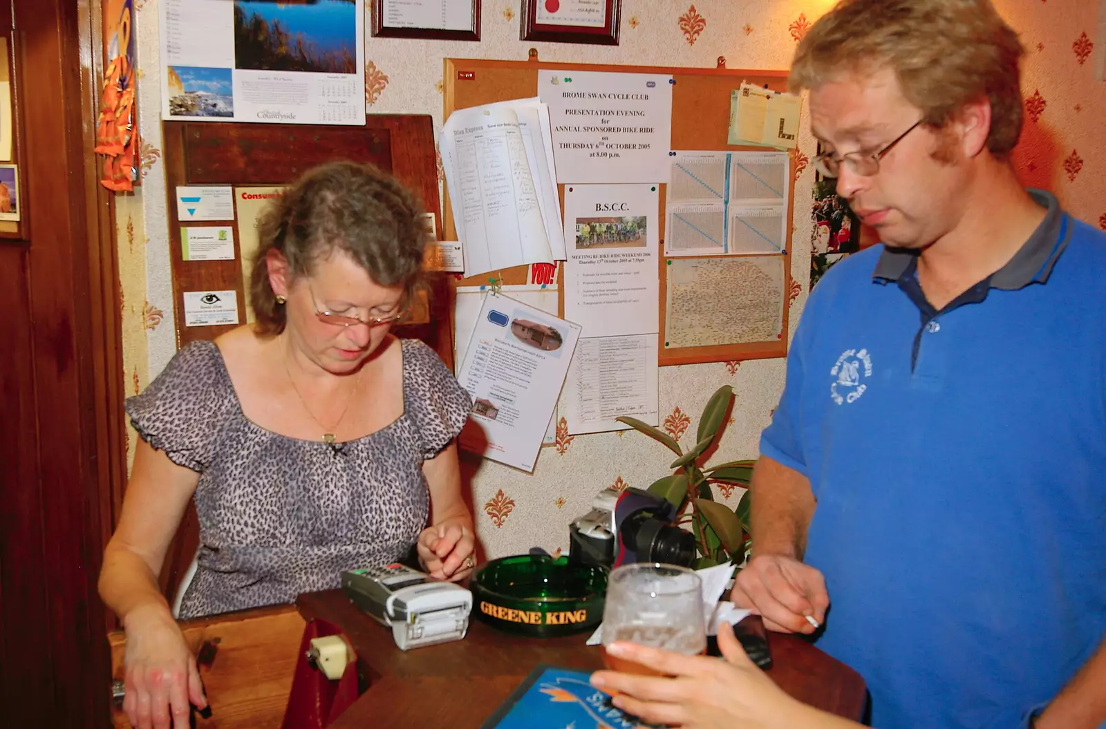 Marc pays his tab, from The BSCC Presentation and a Murder Mystery, Brome and Gislingham, Suffolk- 6th October 2005