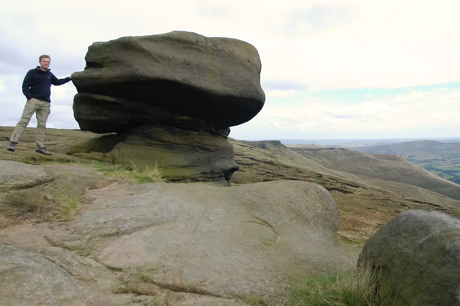 Holding on to a wind-sculpted rock, from The Pennine Way: Lost on Kinder Scout, Derbyshire - 9th October 2005