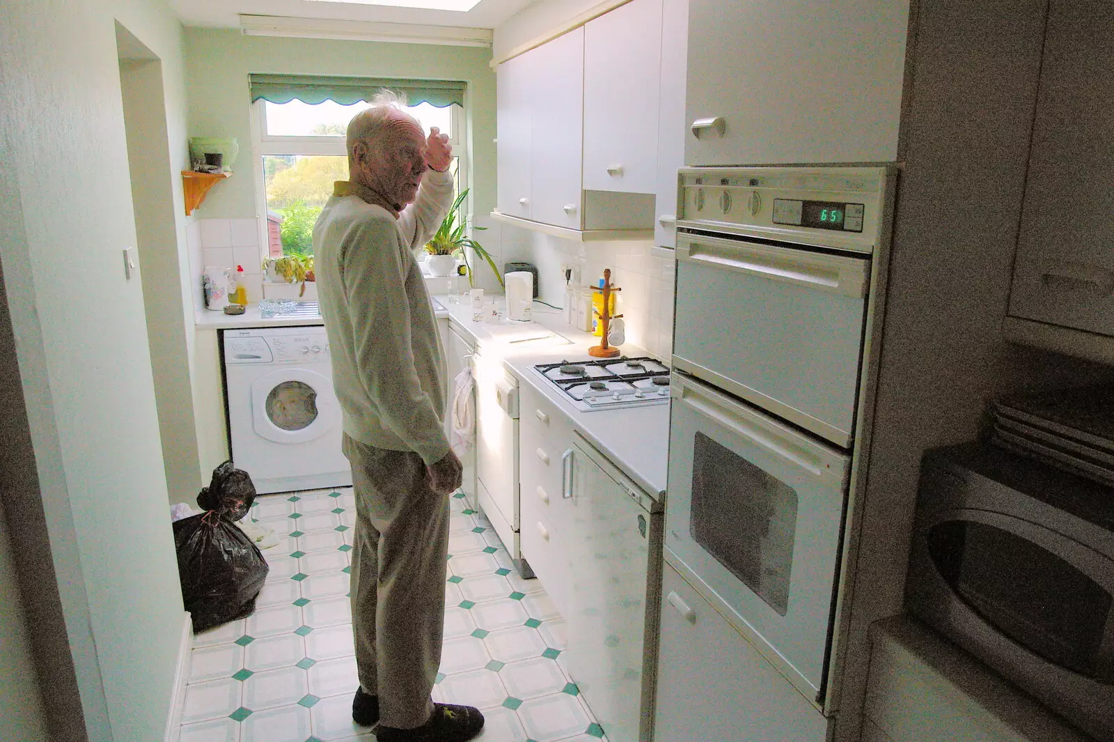 The Old Chap scratches his head in the kitchen, from A Trip Around Macclesfield and Sandbach, Cheshire - 10th September 2005