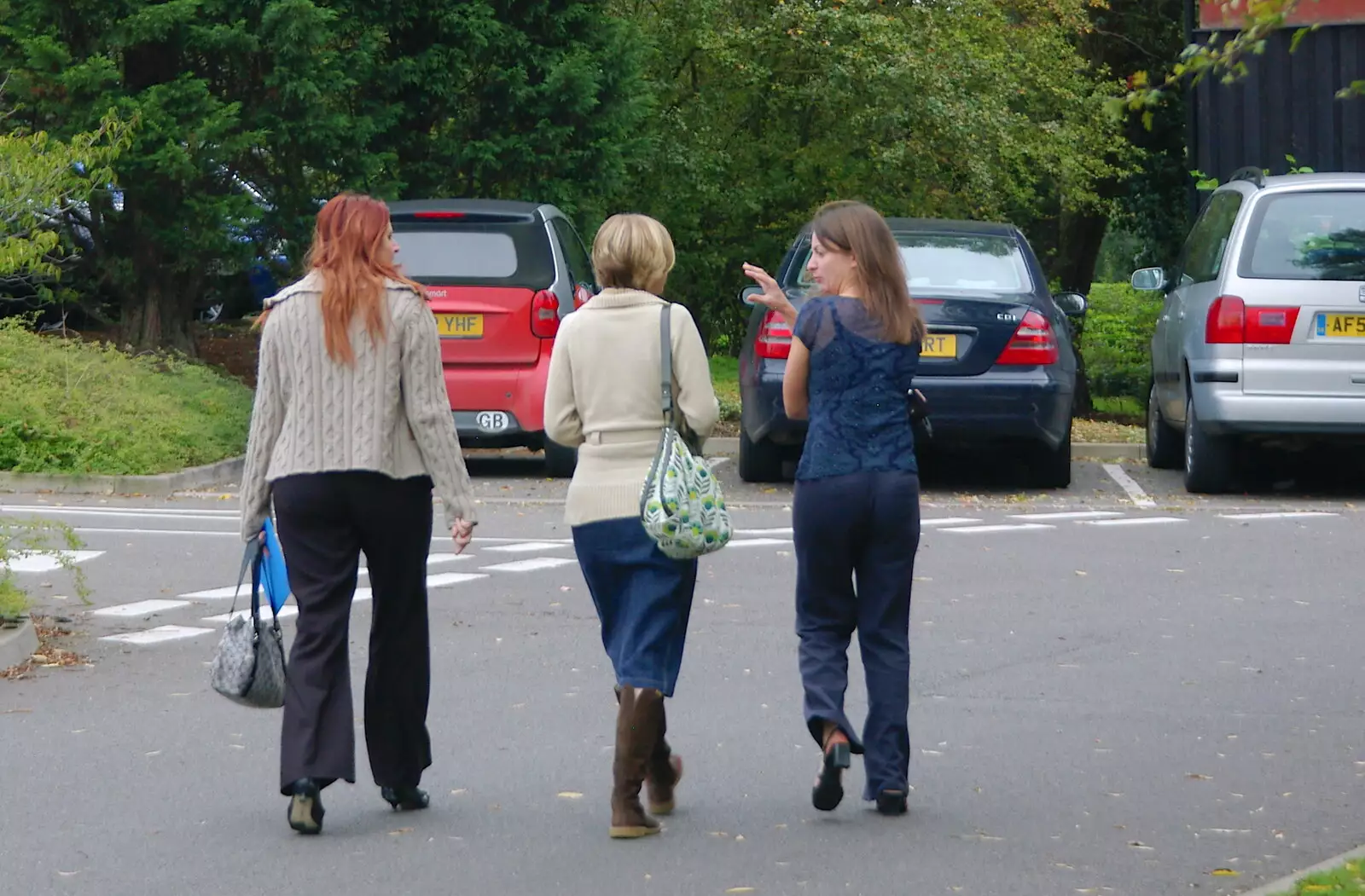 The office girls wander off, from Andrew Leaves Qualcomm, Cambridge - 18th October 2005