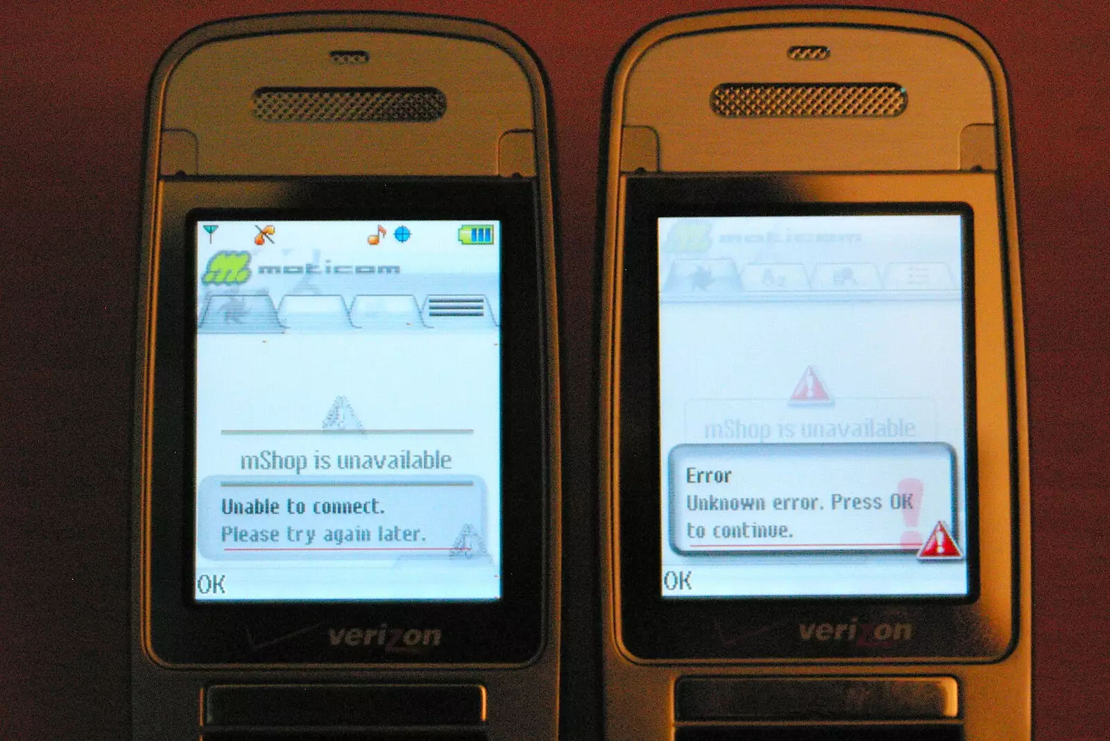 A Moticom mShop UI on a couple of flip phones, from Andrew Leaves Qualcomm, Cambridge - 18th October 2005