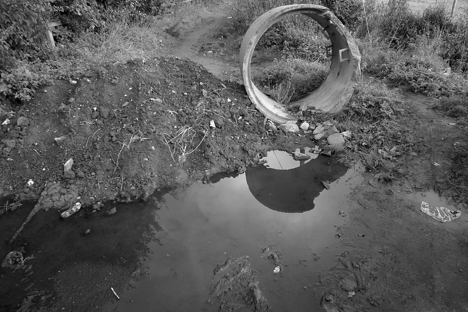 A pipe and standing water, from Suffolk County Council Dereliction, and Cotton Flamenco, Suffolk - 22nd October 2005