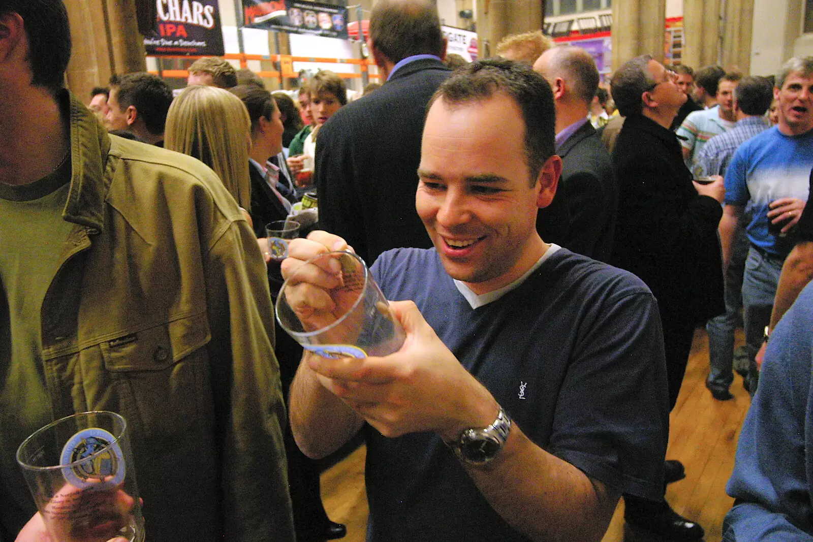 Russell tries to scratch off a Norwich quote, from The 28th Norwich Beer Festival, St. Andrew's Hall, Norwich - 26th October 2005