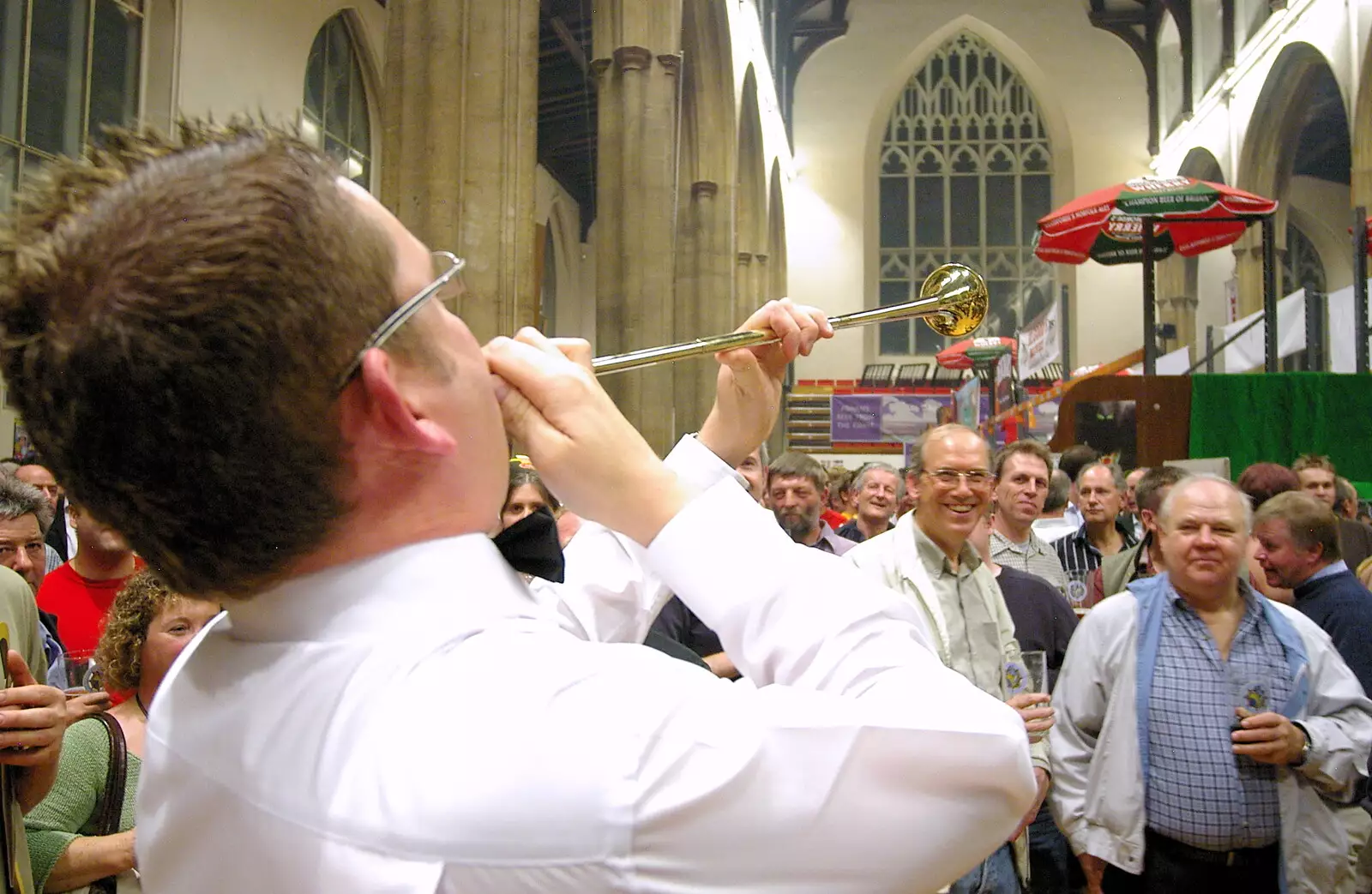 The post-horn guy heads off into the crowds, from The 28th Norwich Beer Festival, St. Andrew's Hall, Norwich - 26th October 2005