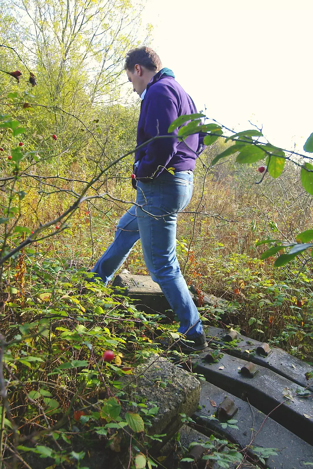 Dan climbs up after we sneak through the fence, from Disused Cambridge Railway, Milton Road, Cambridge - 28th October 2005