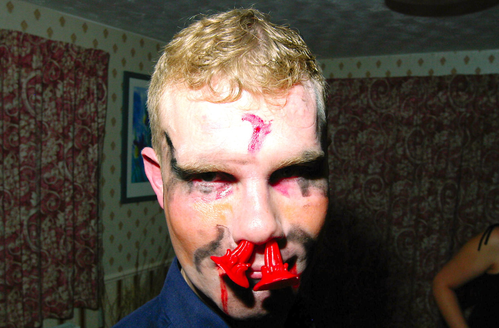 Mikey-P sticks his horns up his nose from Jen's Hallowe'en Party and Sazzle's Leaving Do, Mission Road, Diss - 28th October 2005