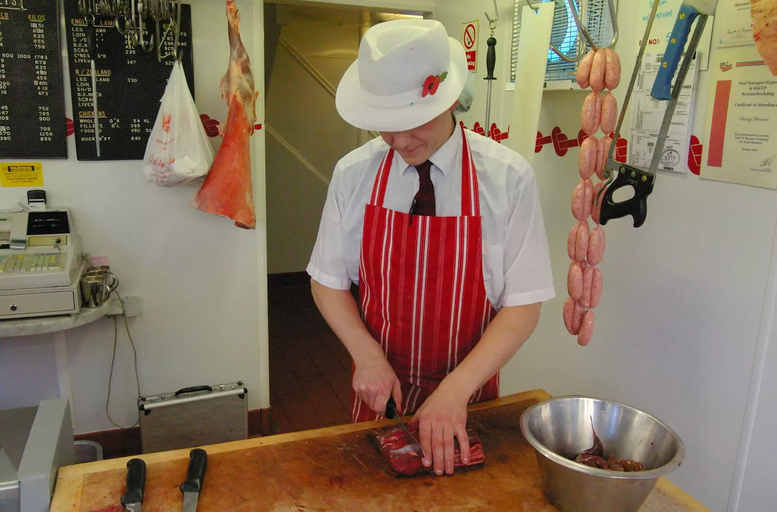 Richard chops some meat up, from Burnt-out Recycling Bins and Fireworks from a Distance, Diss, Norfolk - 4th November 2005