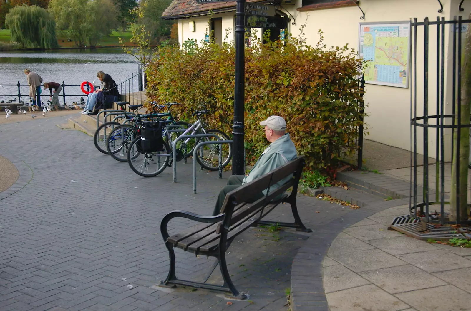 Some dude sits alone on a bench, from Burnt-out Recycling Bins and Fireworks from a Distance, Diss, Norfolk - 4th November 2005