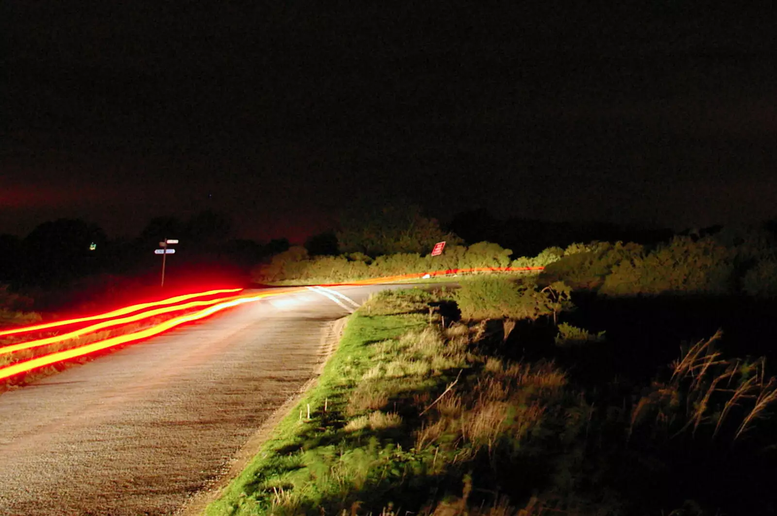 A car passes on Wortham Ling, from Burnt-out Recycling Bins and Fireworks from a Distance, Diss, Norfolk - 4th November 2005