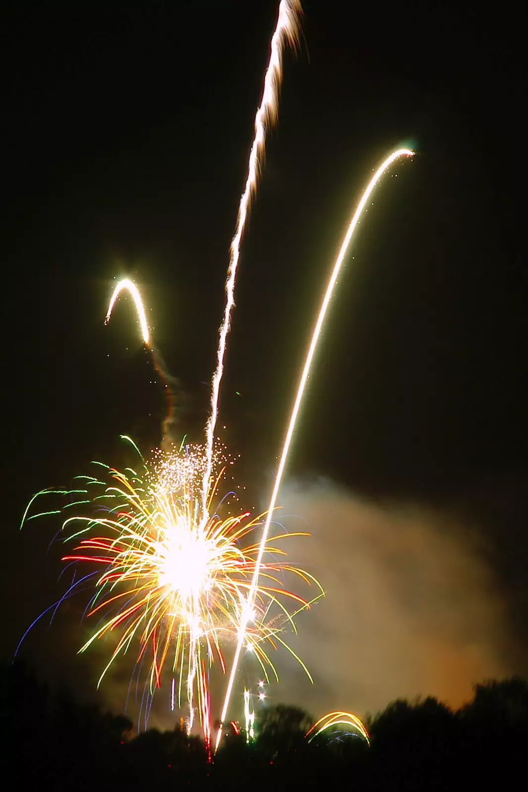 A multiple launch from the Cricket Club, from Burnt-out Recycling Bins and Fireworks from a Distance, Diss, Norfolk - 4th November 2005