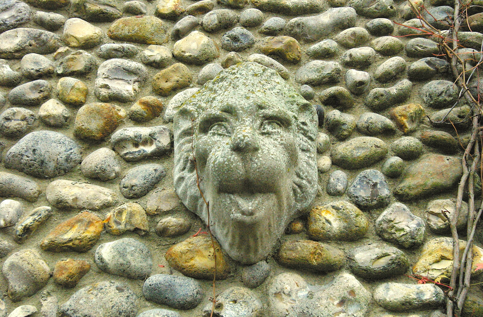 An interesting gargoyle in a flint wall  from Mother, Mike and the Stiffkey Light Shop, Cley and Holkham - 6th November 2005