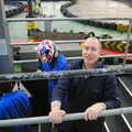 Russell McHugh hangs off a railing, Qualcomm goes Karting in Caxton, Cambridgeshire - 7th November 2005