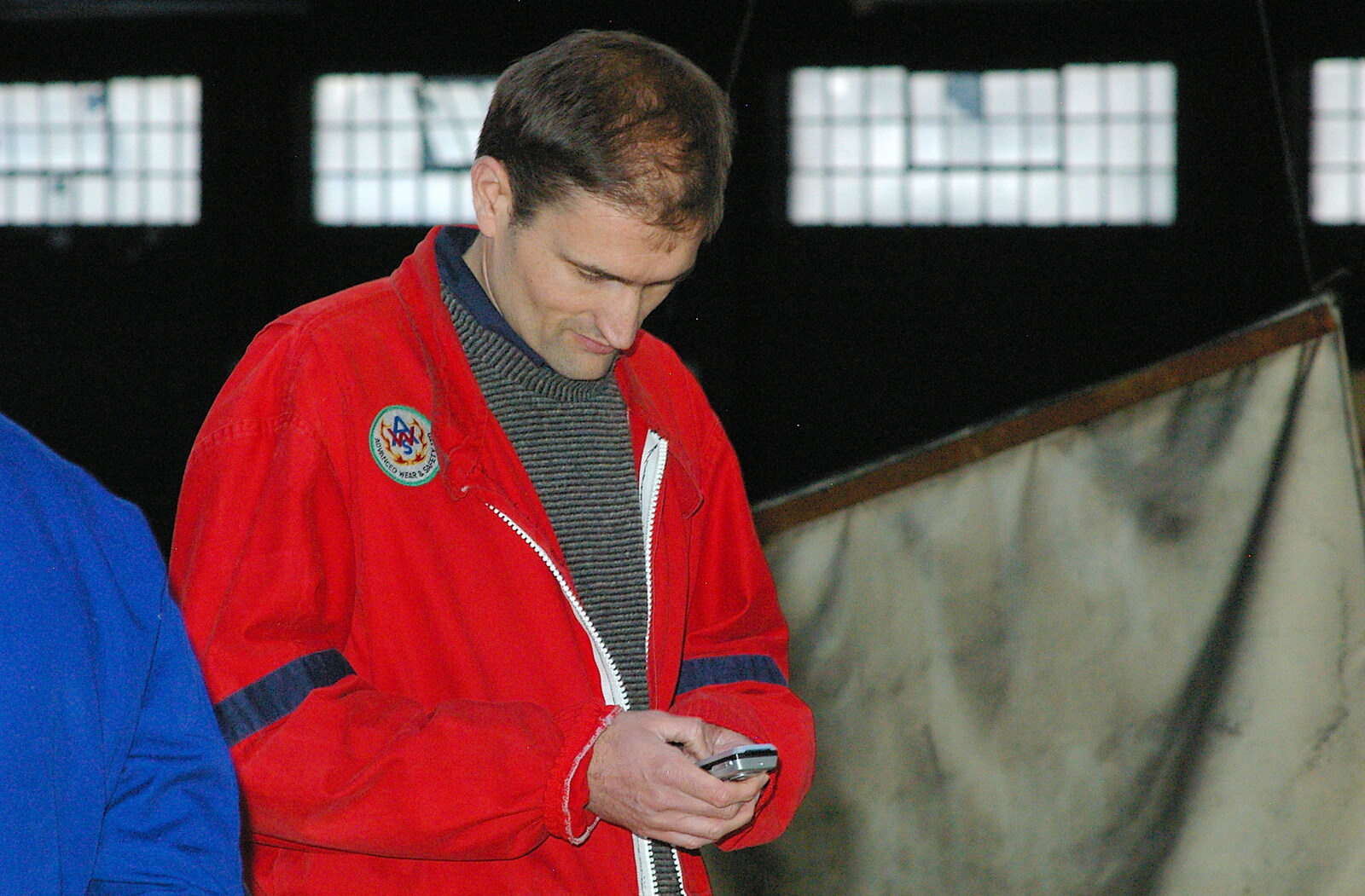Bob checks his phone from Qualcomm goes Karting in Caxton, Cambridgeshire - 7th November 2005