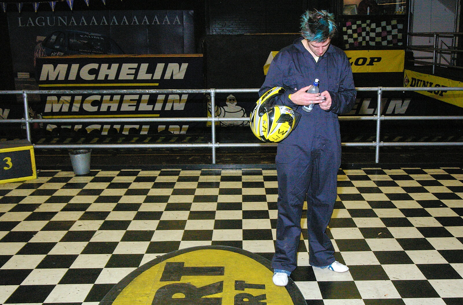 Rob checks his phone from Qualcomm goes Karting in Caxton, Cambridgeshire - 7th November 2005