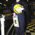 Francis holds up the E card, Qualcomm goes Karting in Caxton, Cambridgeshire - 7th November 2005