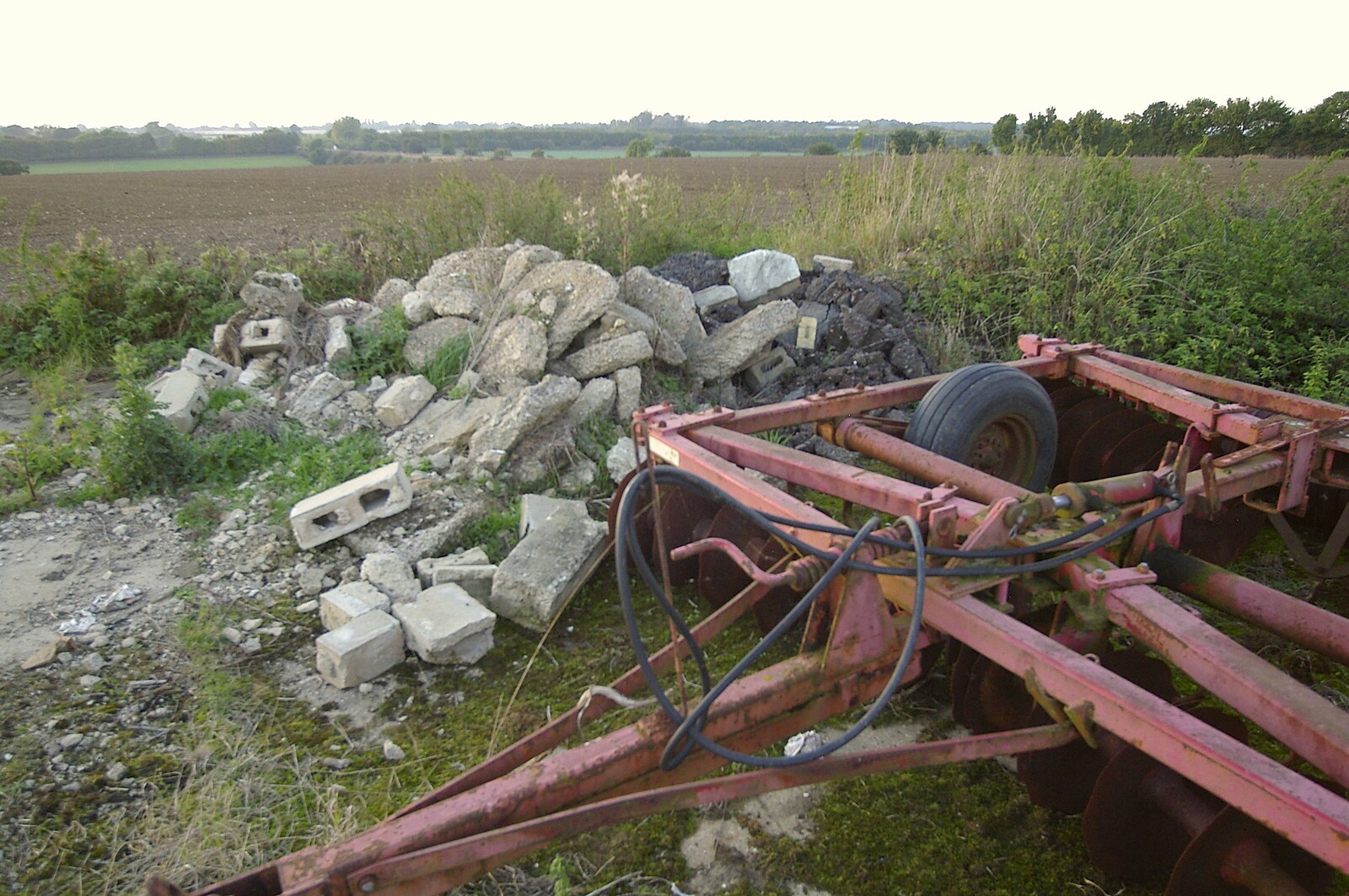 A pile of rubble and discarded farm equipment from The Destruction of Padley's, and Alex Hill at the Barrel, Diss and Banham - 12th November 2005