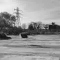 A solitary digger bucket, and a pylon, The Destruction of Padley's, and Alex Hill at the Barrel, Diss and Banham - 12th November 2005