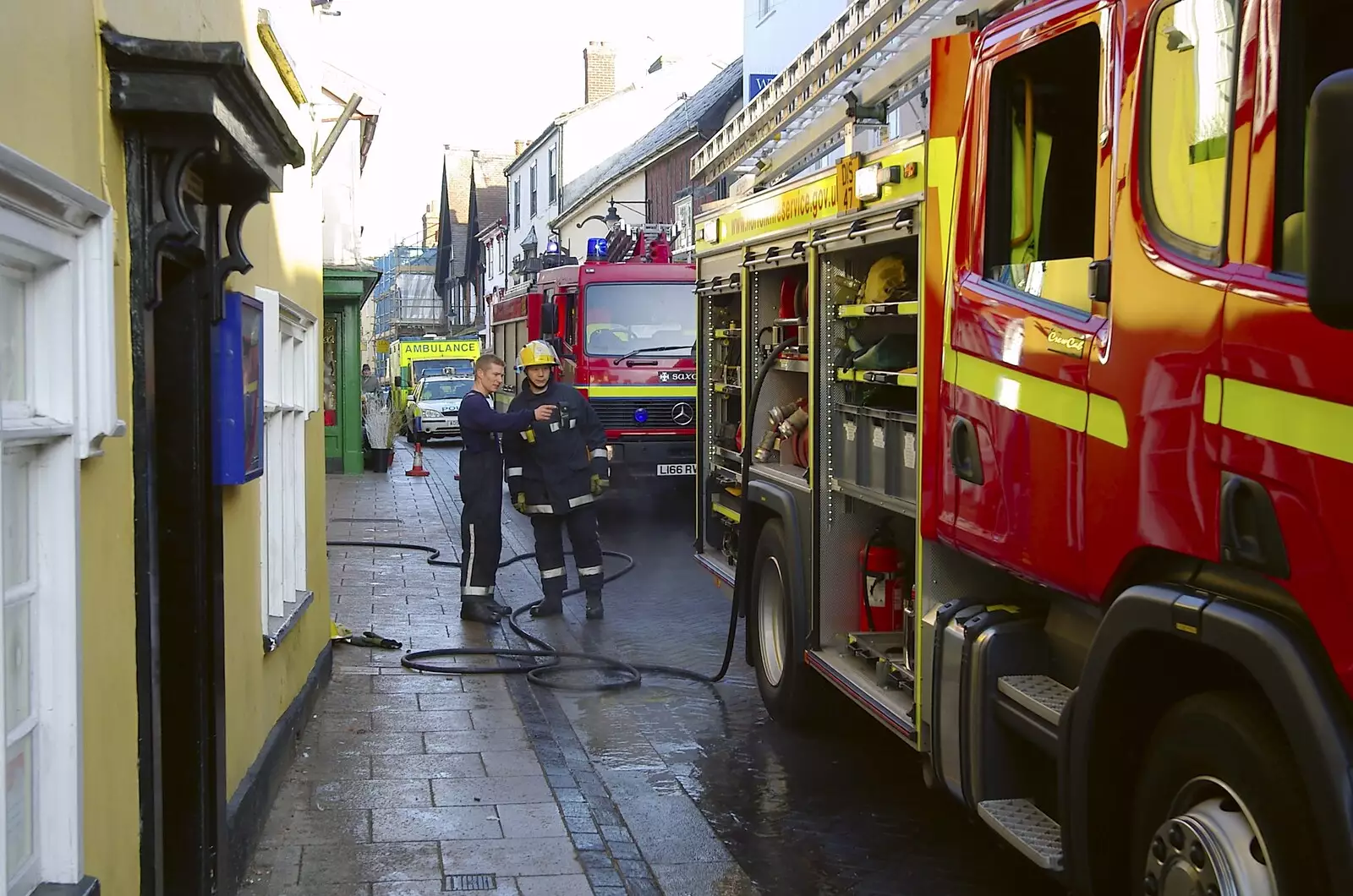 A couple of firemen discuss stuff, from USA Chicken Catches Fire: Gov and the Ambulance, Diss, Norfolk - 19th November 2005