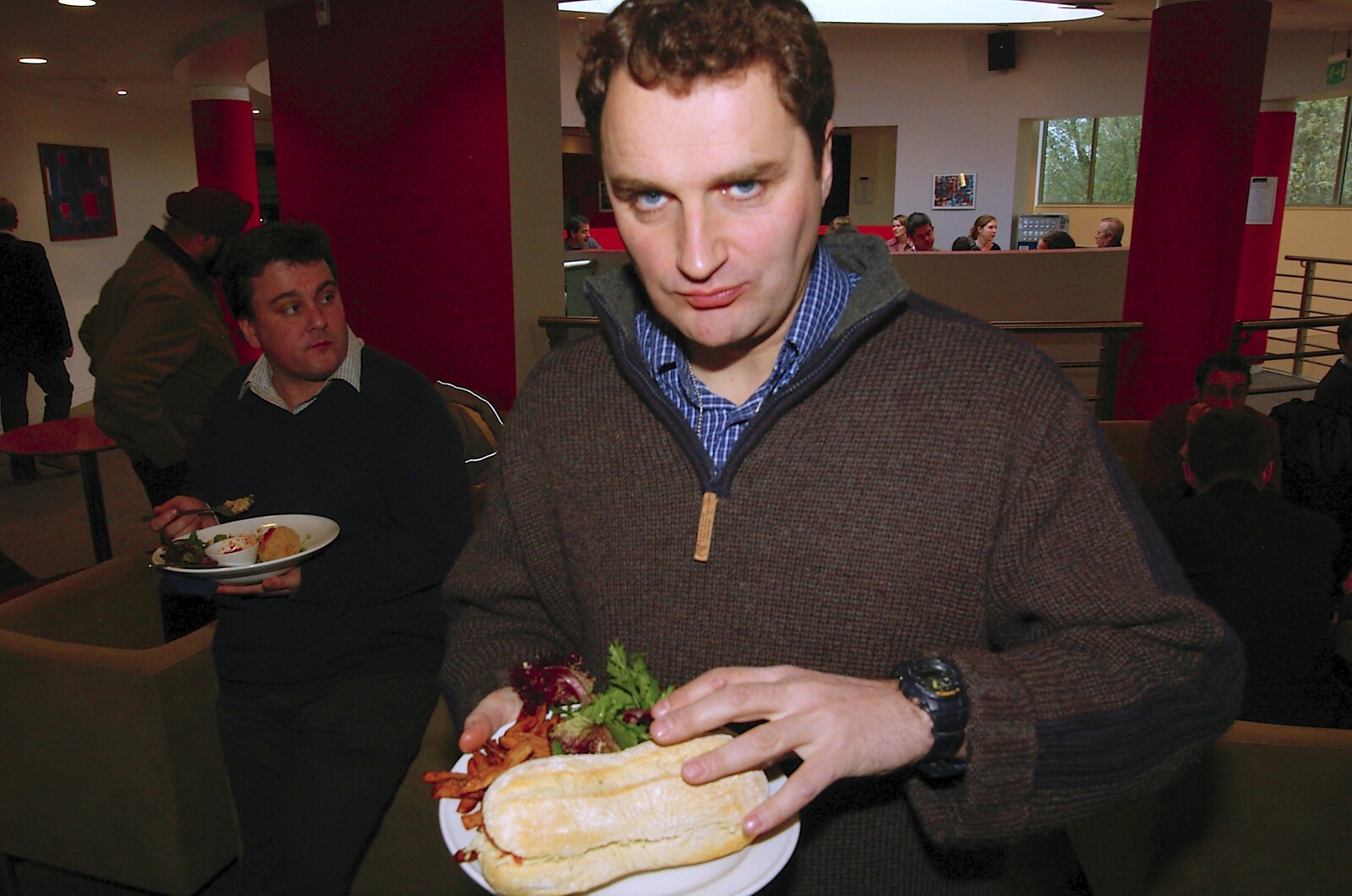 Dan looks up from his Ciabatta from Thornham Walled Garden, and Bob Last Leaves the Lab, Cambridge - 20th November 2005