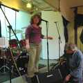 Jo's on stage as Rob fiddles with a monitor, Pheasants, Sunsets and The BBs at Bressingham, Norfolk - 11th December 2005