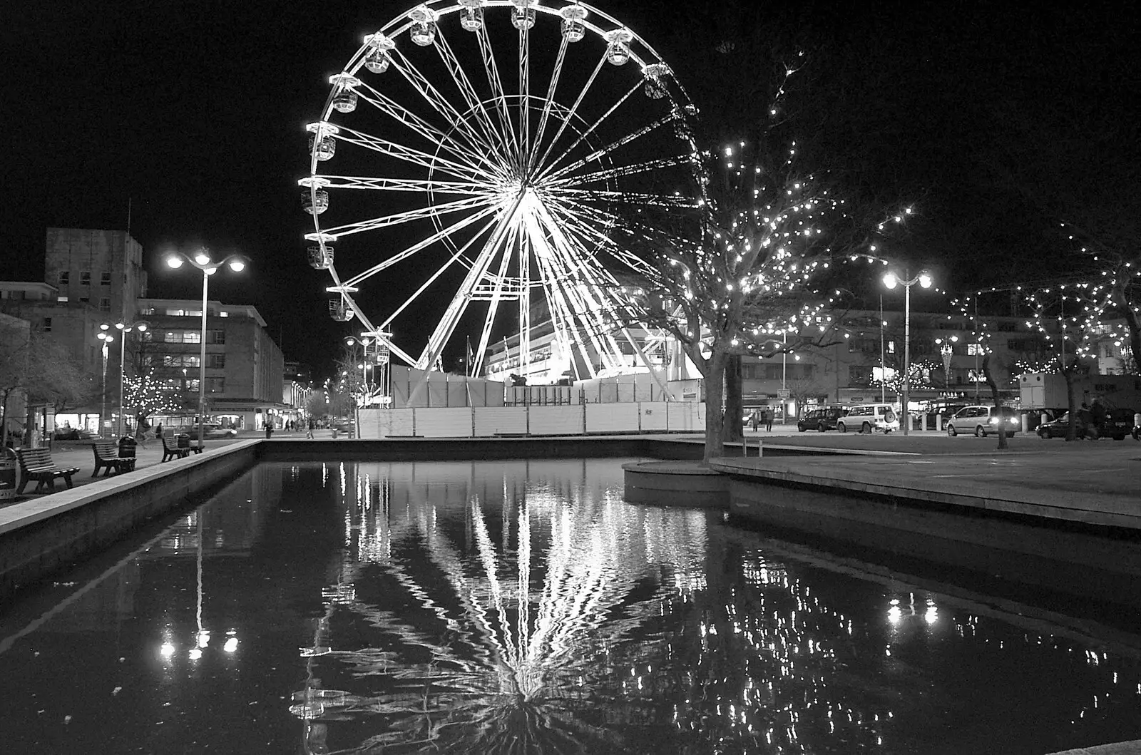 A Ferris wheel reflected in the Civic Centre pond, from Uni: A Polytechnic Reunion, Plymouth, Devon - 17th December 2005