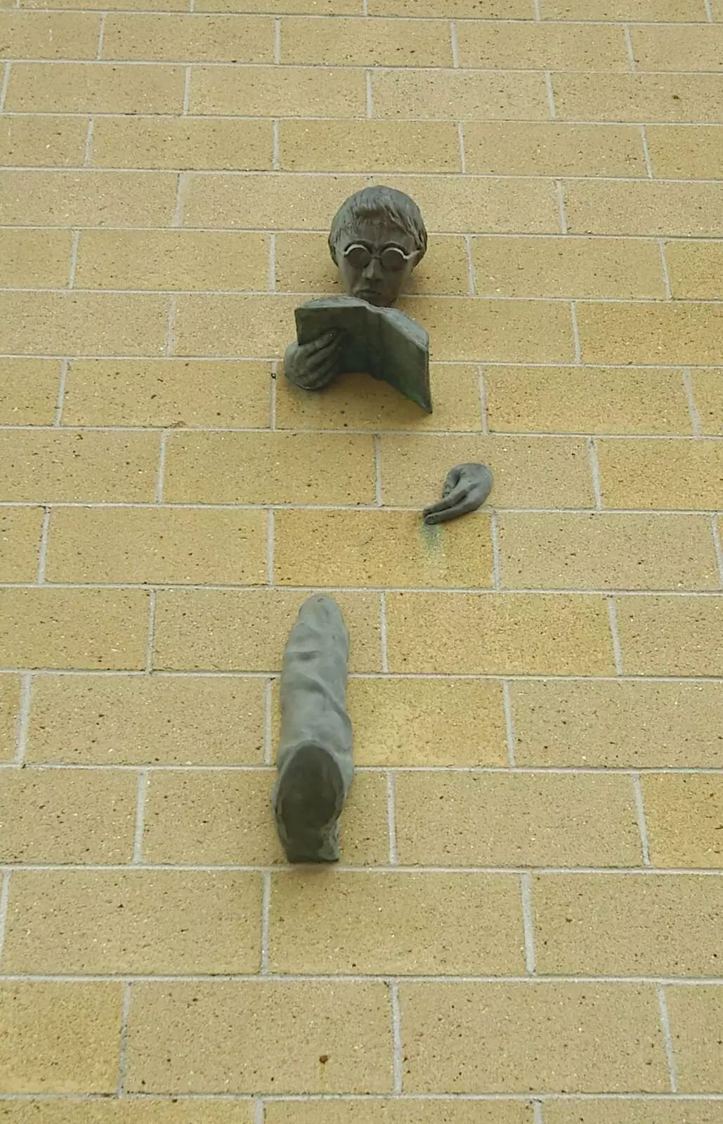 The dude walking out of the LRC wall, from Uni: A Wander Around the Campus, Plymouth, Devon - 18th December 2005