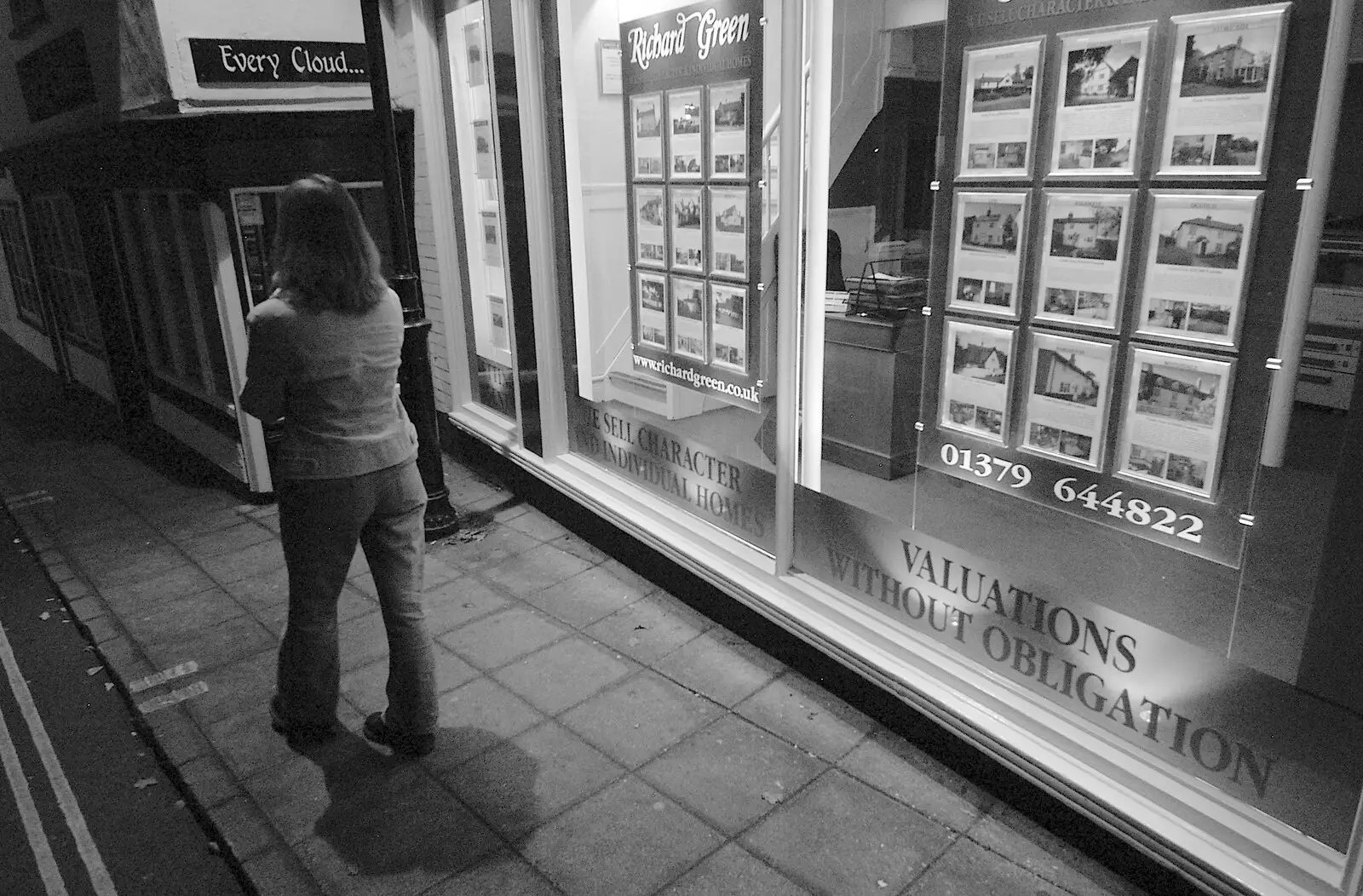 Suey walks past an estate agents, from Pre-Christmas Roundup: Wigs, Beers and Kebabs, Diss, Norfolk - 24th December 2005